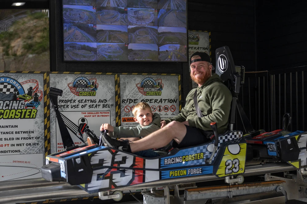 father and son in Pigeon Forge Racing Coaster cart