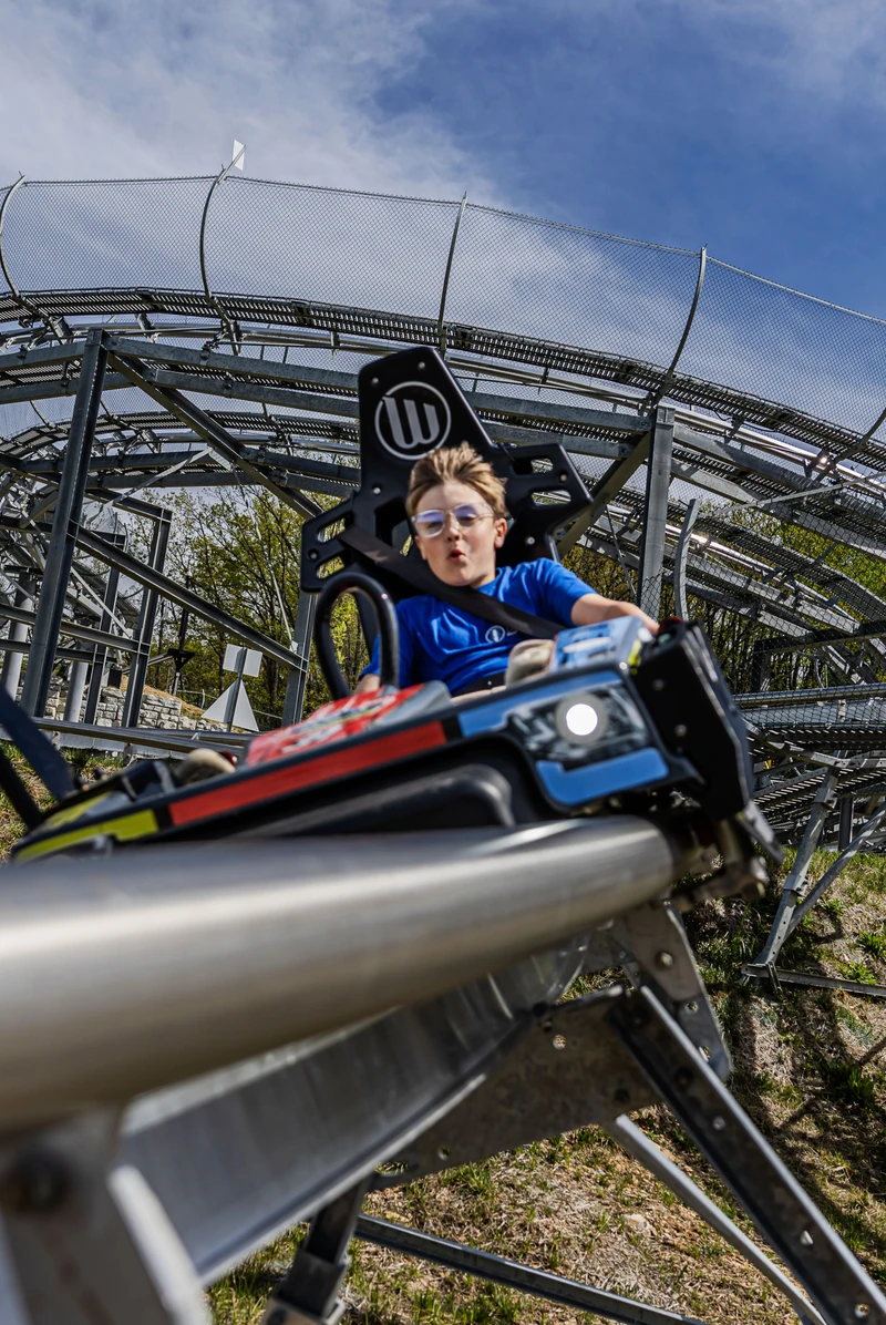 boy riding the Pigeon Forge Racing Coaster